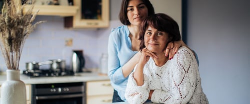 mother and daughter at the kitchen table