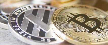 QuoteInspector - Scattered cryptocurrency coins