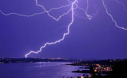 Lightning over St-Laurent River on a stormy night in Quebec - JP Marquis