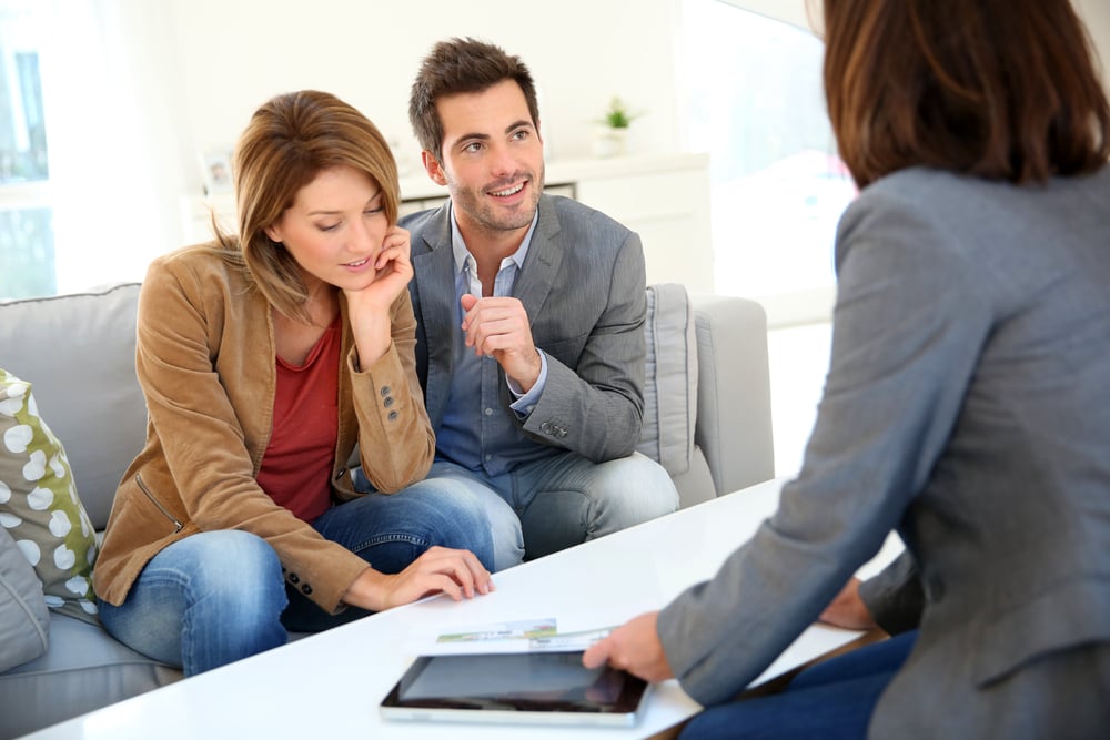 Couple meeting financial adviser