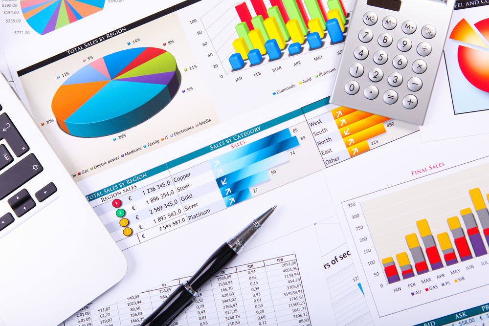 Financial paper charts and graphs on the table-2